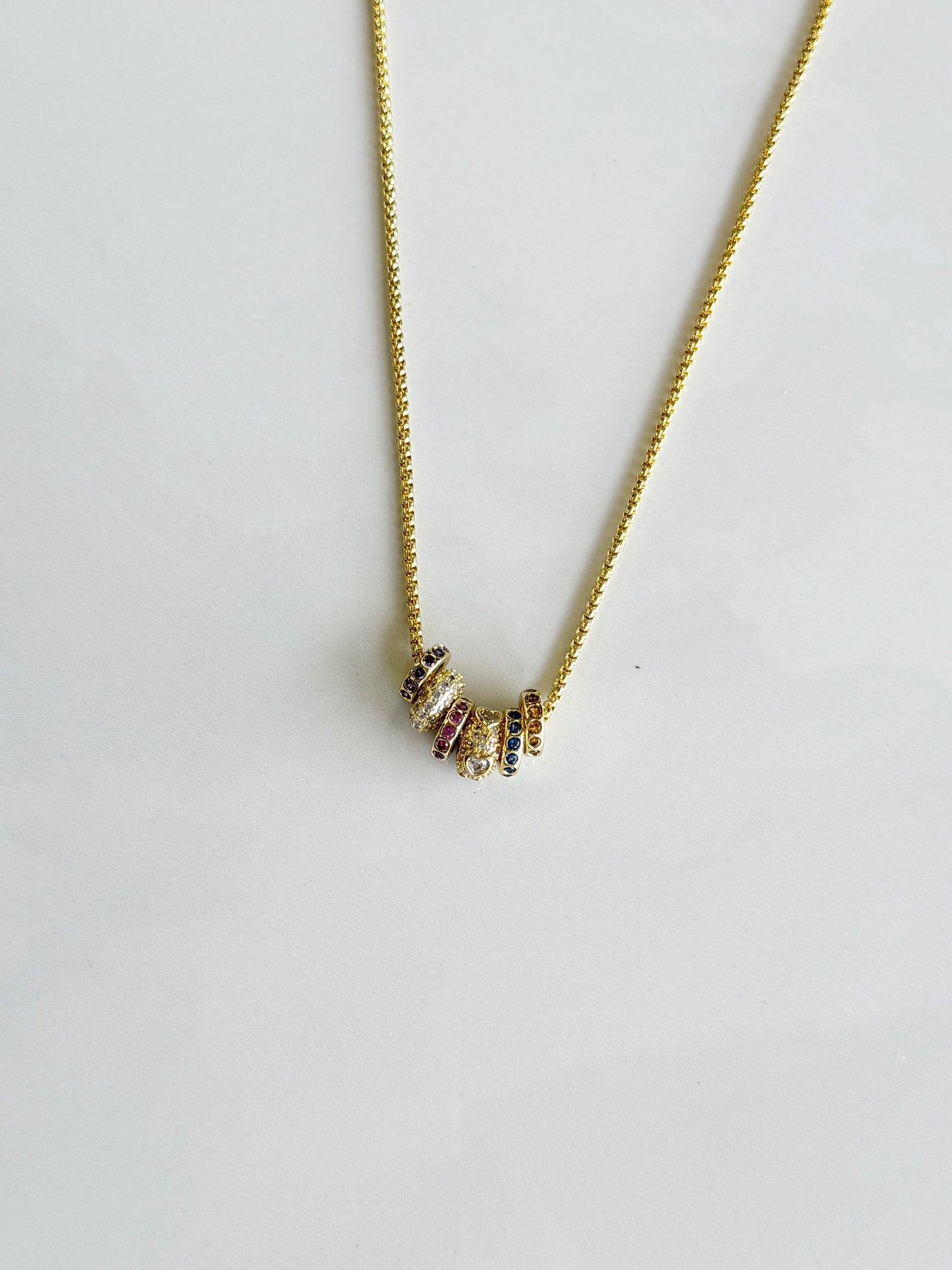 Slide Birthstone Necklace - a gold necklace with birthstone rondelles