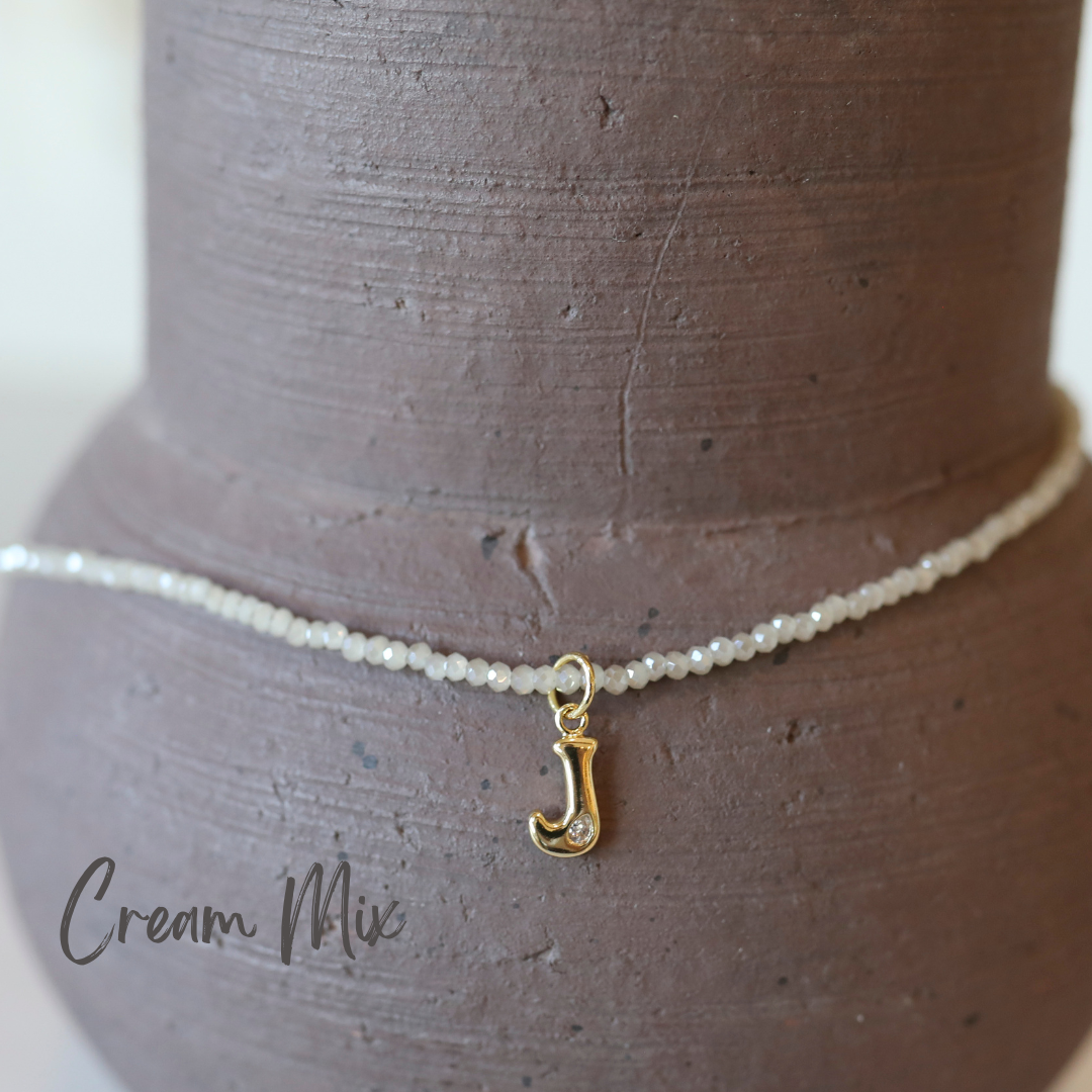 Micro Faceted Initial Necklace in Cream Mix