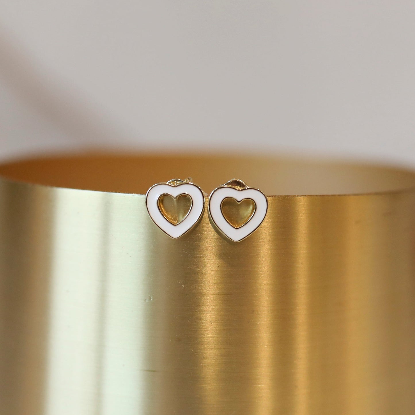White Hollow Heart Studs