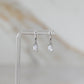 CZ Drop Huggie Hoops in Silver