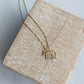 Mini Engraved Charm Necklace with a pearl S initial on a twist chain