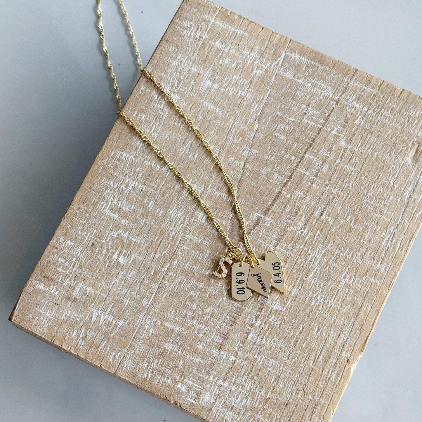 Mini Engraved Charm Necklace with a pearl S initial on a twist chain