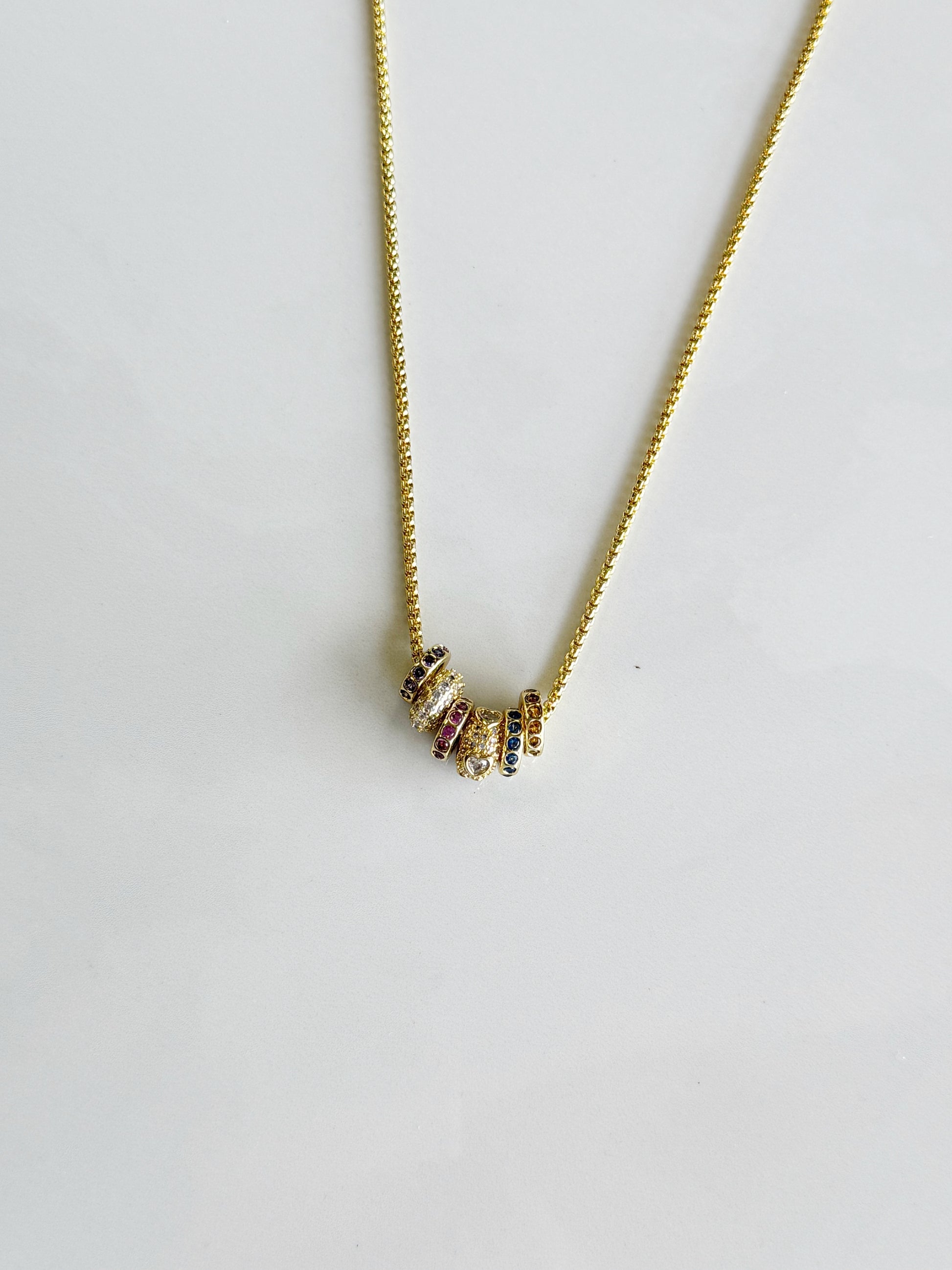 Slide Birthstone Necklace - a gold necklace with birthstone rondelles 