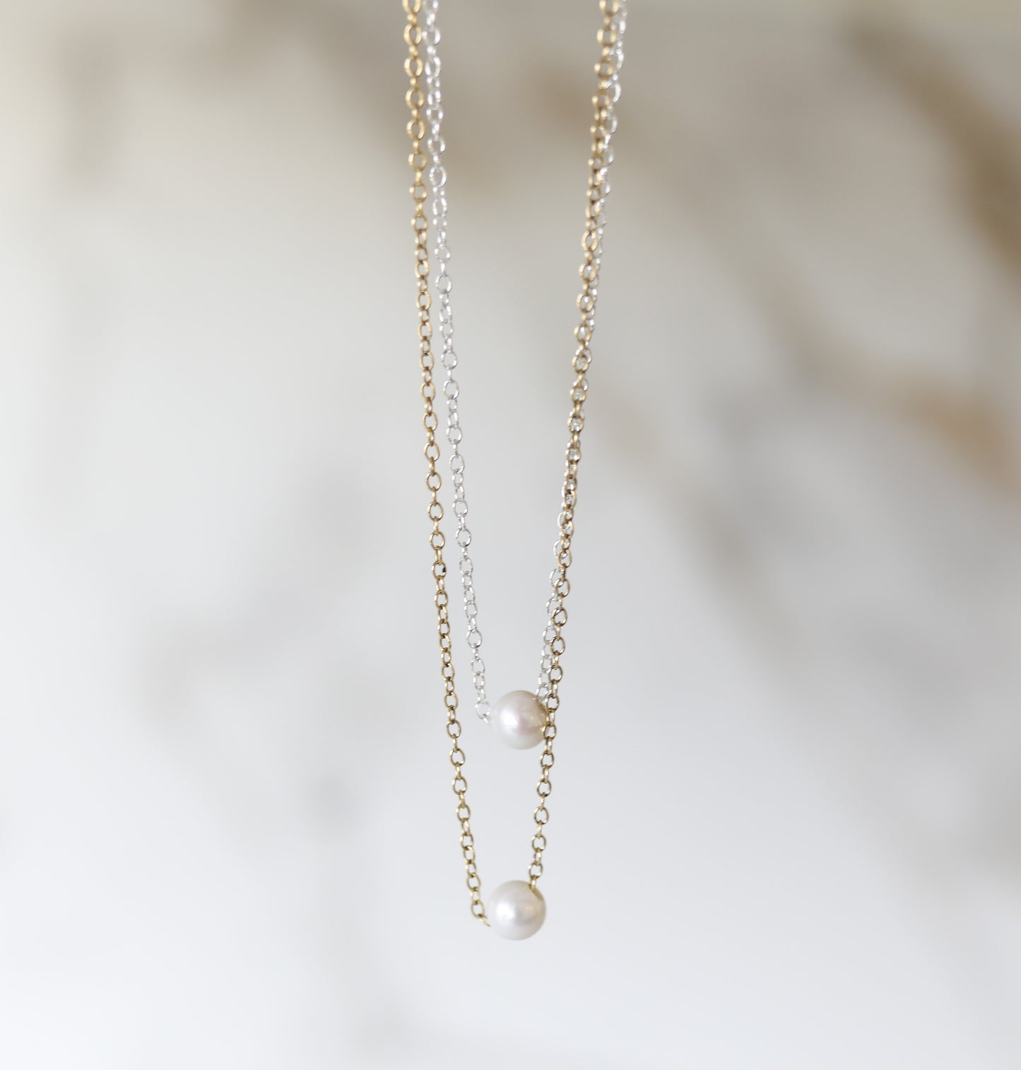 Harmony Necklace with an Akoya Pearl available in Gold and Silver